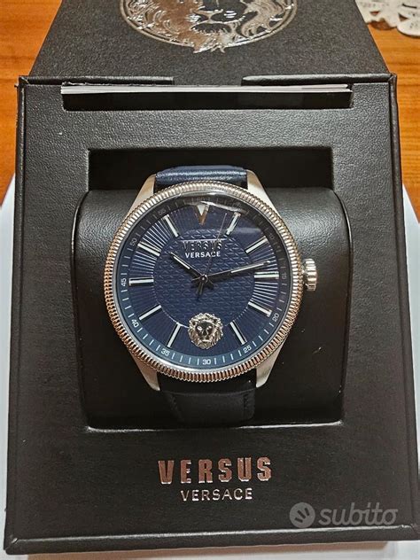 VERSUS BY VERSACE Scarpe, Orologio 